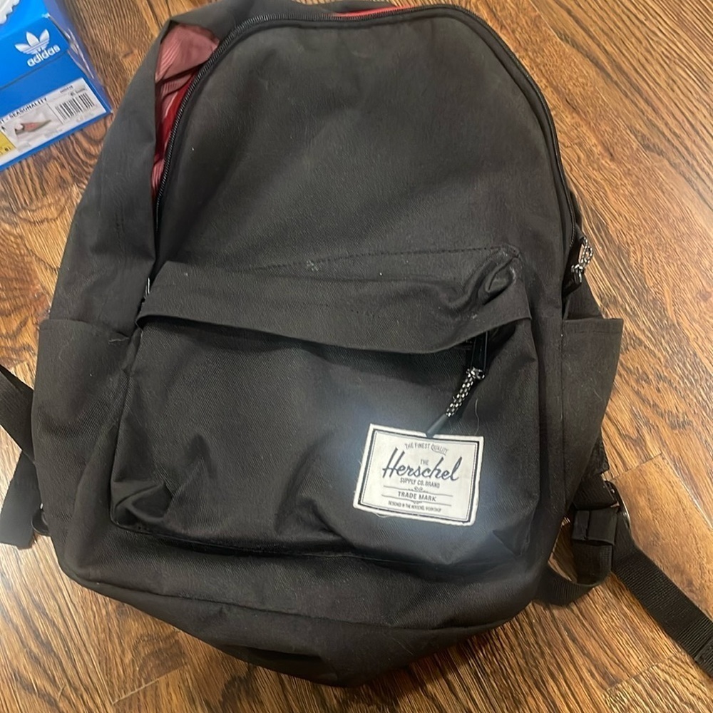 Use Herschel black book bag